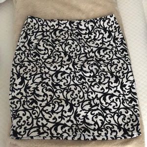 MOTEL ROCKS - Black and White Zipped Mini Stretchy Skirt, S-M, Filigree pattern